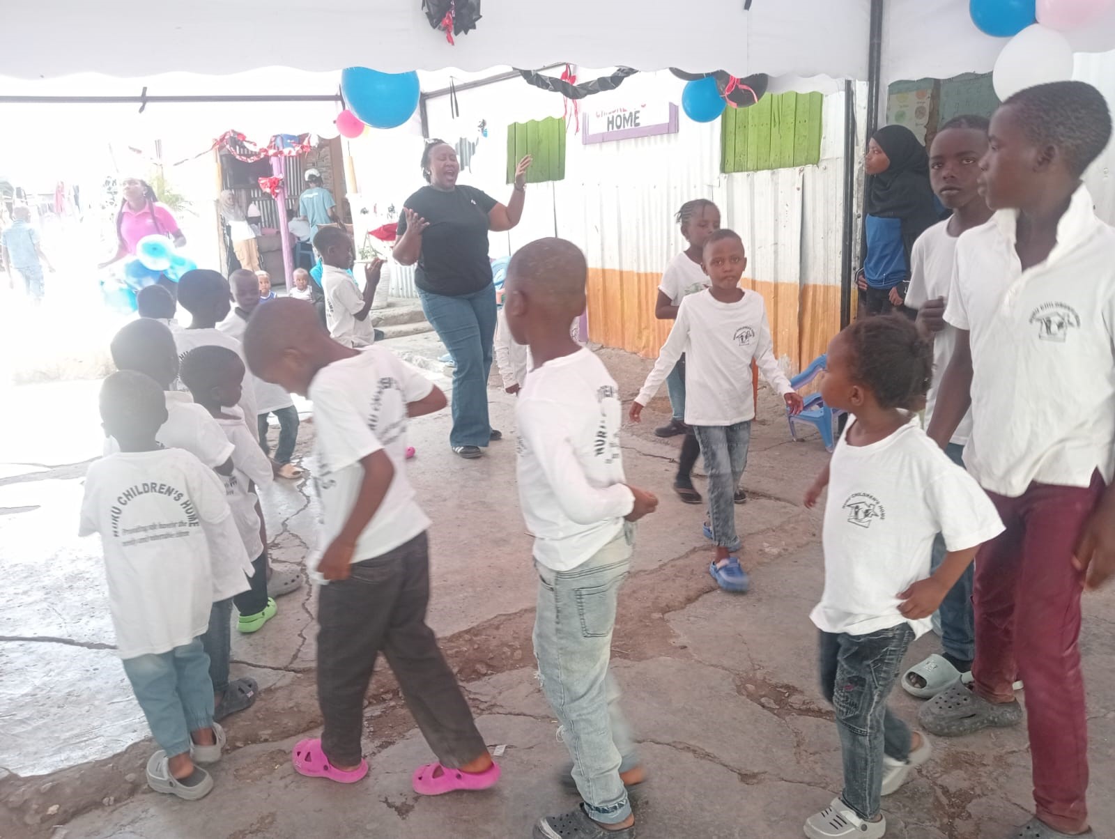 Nuru Toto children playing together
